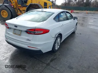 2019 Ford Fusion Hybrid SE with VIN 3FA6P0LUXKR104850, listed as a IAAI auction lot 41870242 with 114,943 mi miles. Bid and sale history available at carsss.com. Image 4.