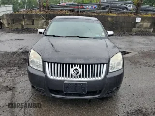 2008 Mercury Sable Premier z VIN 1MEHM43W98G604677, wystawiony jako Copart lot #57840985 z przebiegiem 171 695 mil mil oraz Szkoda całkowita • Salvage title. Historia ofert i sprzedaży dostępna na DreamBid. Obrazek 5.