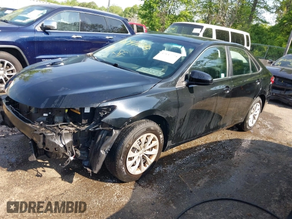 2015 Toyota Camry XLE with VIN 4T4BF1FKXFR479536, listed as a IAAI auction lot 42147724 with 88,853 mi miles and . Bid and sale history available at DreamBid. Image 2.