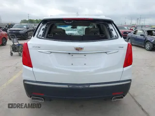 2017 Cadillac XT5 Luxury FWD z VIN 1GYKNBRS3HZ195197, wystawiony jako IAAI lot #42033419 z przebiegiem 76 709 mil mil oraz . Historia ofert i sprzedaży dostępna na DreamBid. Obrazek 16.