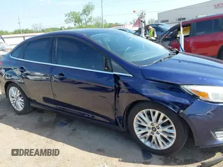 2017 Ford Focus Titanium with VIN 1FADP3J29HL204892, listed as a IAAI auction lot 42032705 with 119,028 mi miles and . Bid and sale history available at DreamBid. Image 14.