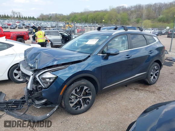 2023 Kia Sportage EX with VIN KNDPVCAGXP7104090, listed as a IAAI auction lot 42144158 with 26,983 mi miles and . Bid and sale history available at DreamBid. Image 18.
