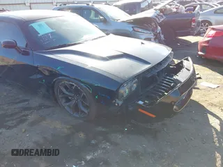 2020 Dodge Challenger SXT with VIN 2C3CDZAG1LH240339, listed as a IAAI auction lot 41613082 with 69,450 mi miles and . Bid and sale history available at DreamBid. Image 18.