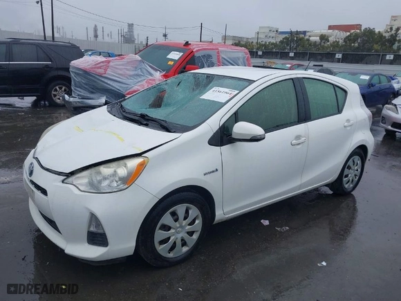 2013 Toyota Prius c One with VIN JTDKDTB36D1544010, listed as a IAAI auction lot 41561964 with 153,572 mi miles. Bid and sale history available at carsss.com. Image 2.