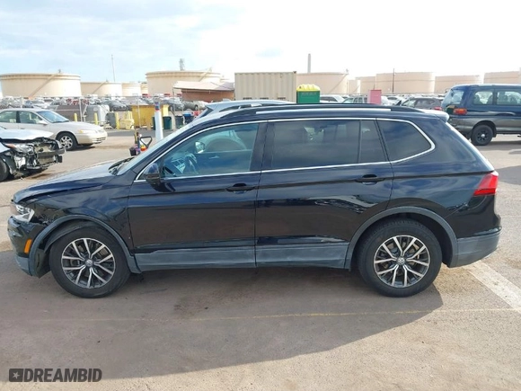 2019 Volkswagen Tiguan SE with VIN 3VV3B7AXXKM012766, listed as a IAAI auction lot 41571347 with 56,594 mi miles. Bid and sale history available at carsss.com. Image 14.