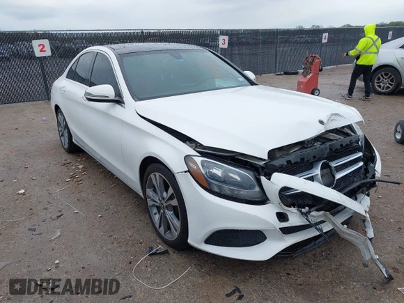 2018 Mercedes-Benz C C 300 with VIN 55SWF4JB1JU237940, listed as a IAAI auction lot 41911087 with 57,362 mi miles and . Bid and sale history available at carsss.com. Image 1.