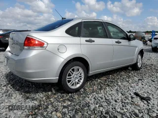 2009 Ford Focus SE with VIN 1FAHP35N09W267059, listed as a Copart auction lot 54155965 with 129,768 mi miles and Salvage Title. Bid and sale history available at carsss.com. Image 3.
