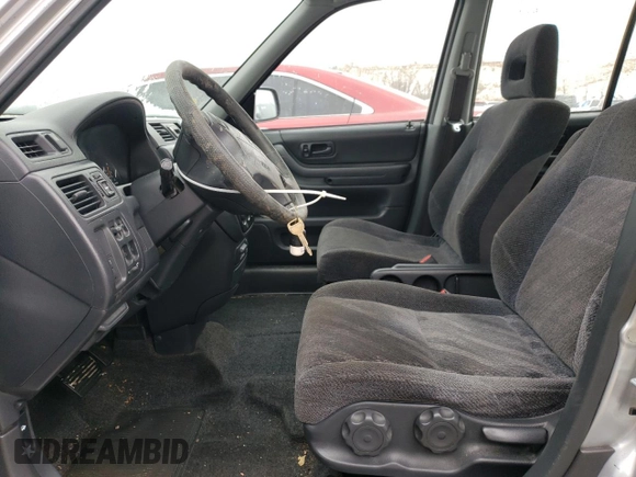 1999 Honda CR-V LX with VIN JHLRD1842XC076548, listed as a Copart auction lot 45907185 with 197,674 mi miles and Salvage Title. Bid and sale history available at carsss.com. Image 7.