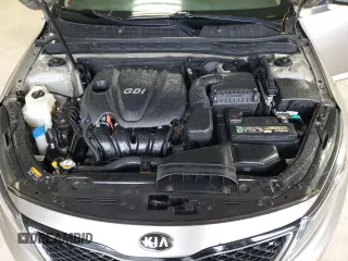 2014 Kia Optima LX z VIN KNAGM4A73E5494917, wystawiony jako Copart lot #65395515 z przebiegiem 119 259 mil mil oraz Czysty tytuł • Clean title. Historia ofert i sprzedaży dostępna na DreamBid. Obrazek 11.