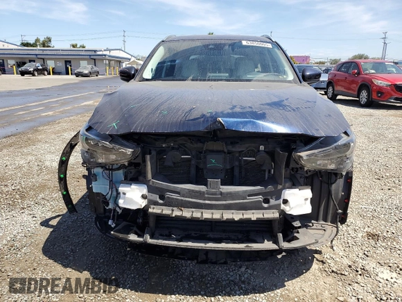 2020 Mazda CX-5 Grand Touring z VIN JM3KFADM4L0794765, wystawiony jako Copart lot #63850005 z przebiegiem 53 270 mil mil oraz Szkoda całkowita • Salvage title. Historia ofert i sprzedaży dostępna na DreamBid. Obrazek 5.