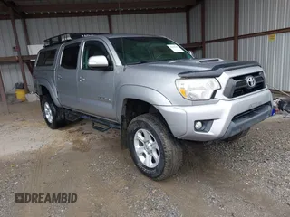 2015 Toyota Tacoma with VIN 5TFLU4ENXFX115198, listed as a IAAI auction lot 41442708 with 148,277 mi miles. Bid and sale history available at carsss.com. Image 1.