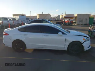 2014 Ford Fusion Titanium with VIN 3FA6P0K96ER234979, listed as a IAAI auction lot 41220106 with 98,068 mi miles. Bid and sale history available at carsss.com. Image 13.