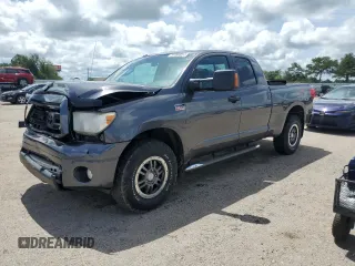 2011 Toyota Tundra 4WD Truck with VIN 5TFUY5F14BX168936, listed as a Copart auction lot 64460524 with 166,212 mi miles and Salvage Title. Bid and sale history available at carsss.com. Image 1.