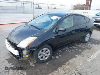 2007 Toyota Prius with VIN JTDKB20U977660315, listed as a IAAI auction lot 42097560 with 158,187 mi miles. Bid and sale history available at carsss.com. Image 2.