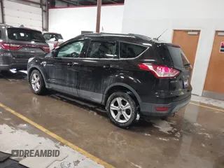 2013 Ford Escape SE with VIN 1FMCU9GX6DUC07446, listed as a IAAI auction lot 41089866 with 119,018 mi miles. Bid and sale history available at carsss.com. Image 3.