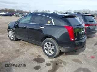 2013 Cadillac SRX Luxury Collection z VIN 3GYFNCE35DS607553, wystawiony jako IAAI lot #42151522 z przebiegiem 104 688 mil mil oraz . Historia ofert i sprzedaży dostępna na DreamBid. Obrazek 3.