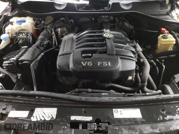 2013 Volkswagen Touareg Lux with VIN WVGEF9BP6DD002607, listed as a Copart auction lot 83420704 with 143,571 mi miles and Salvage Title. Bid and sale history available at DreamBid. Image 11.