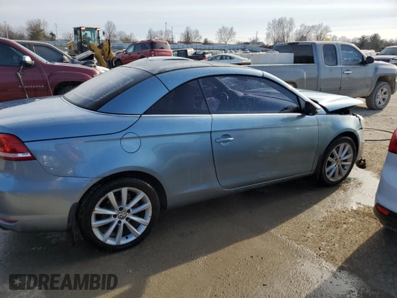 2015 Volkswagen Eos Komfort with VIN WVWBW8AH2FV000829, listed as a Copart auction lot 43082344 with 68,099 mi miles and Salvage Title. Bid and sale history available at DreamBid. Image 3.