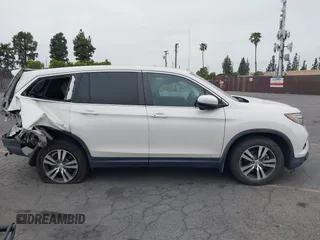 2016 Honda Pilot EX-L with VIN 5FNYF5H54GB037742, listed as a IAAI auction lot 41988112 with 68,459 mi miles and . Bid and sale history available at DreamBid. Image 13.