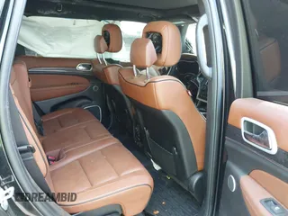 2018 Jeep Grand Cherokee Summit with VIN 1C4RJFJT5JC120523, listed as a IAAI auction lot 42136651 with 75,699 mi miles and . Bid and sale history available at DreamBid. Image 8.