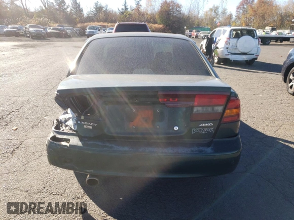 2000 Subaru Legacy L with VIN 4S3BE6352Y6214274, listed as a Copart auction lot 77827604 with 117,520 mi miles and Salvage title. Bid and sale history available at DreamBid. Image 6.