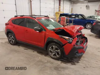 2024 Subaru Crosstrek Premium z VIN JF2GUADC3RH270885, wystawiony jako IAAI lot #42318144 z przebiegiem 23 317 mil mil oraz . Historia ofert i sprzedaży dostępna na DreamBid. Obrazek 1.