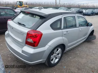 2011 Dodge Caliber Mainstreet with VIN 1B3CB3HA2BD238032, listed as a IAAI auction lot 41865918 with 98,022 mi miles and . Bid and sale history available at DreamBid. Image 4.