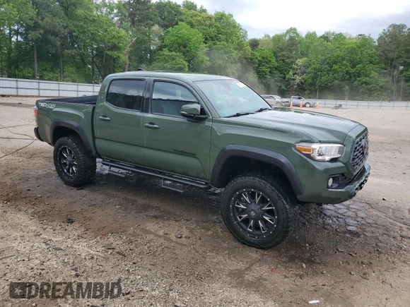 2021 Toyota Tacoma SR with VIN 3TYCZ5AN9MT010768, listed as a Copart auction lot 53961455 with 55,822 mi miles and Salvage title. Bid and sale history available at DreamBid. Image 4.