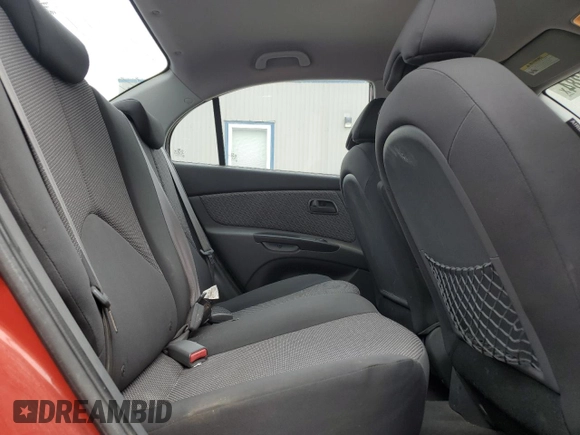 2010 Kia Rio LX with VIN KNADH4A37A6665399, listed as a Copart auction lot 72571284 with 132,610 mi miles and Salvage Title. Bid and sale history available at DreamBid. Image 10.