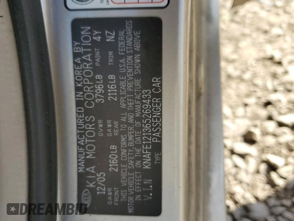 2006 Kia Spectra EX z VIN KNAFE121365269433, wystawiony jako Copart lot #56634735 z przebiegiem 86 551 mil mil oraz Szkoda całkowita • Salvage title. Historia ofert i sprzedaży dostępna na DreamBid. Obrazek 12.