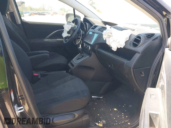 2012 Mazda 5 Sport with VIN JM1CW2BL4C0104669, listed as a IAAI auction lot 42048877 with 115,660 mi miles and . Bid and sale history available at DreamBid. Image 5.