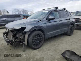 2018 Volkswagen Tiguan S with VIN 3VV0B7AX0JM094637, listed as a Copart auction lot 42960305 with 127,582 mi miles and Salvage Title. Bid and sale history available at DreamBid. Image 1.