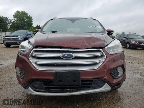 2018 Ford Escape Titanium z VIN 1FMCU0J93JUA70449, wystawiony jako Copart lot #59303245 z przebiegiem 165 907 mil mil oraz Szkoda całkowita • Salvage title. Historia ofert i sprzedaży dostępna na DreamBid. Obrazek 5.