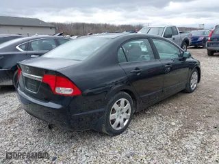 2009 Honda Civic Sdn LX with VIN 19XFA16559E020040, listed as a IAAI auction lot 41847370 with 239,239 mi miles. Bid and sale history available at carsss.com. Image 4.