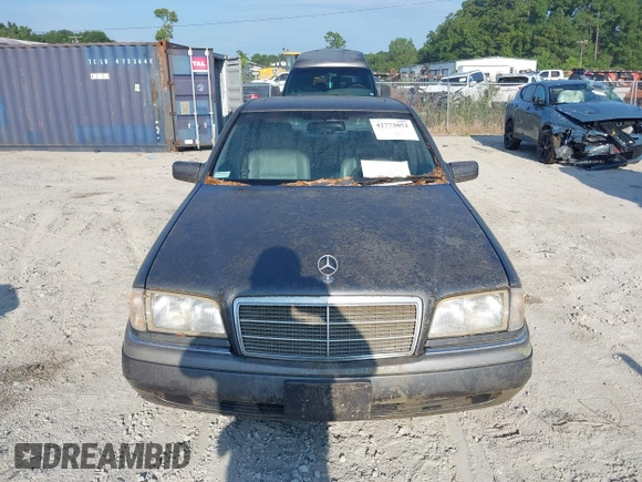 1997 Mercedes-Benz C with VIN WDBHA28E7VA496104, listed as a IAAI auction lot 42773052 with 258,692 mi miles and . Bid and sale history available at DreamBid. Image 6.