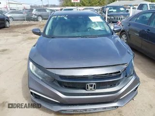 2019 Honda Civic LX with VIN 19XFC2F61KE037495, listed as a IAAI auction lot 41891007 with 90,262 mi miles and . Bid and sale history available at DreamBid. Image 12.