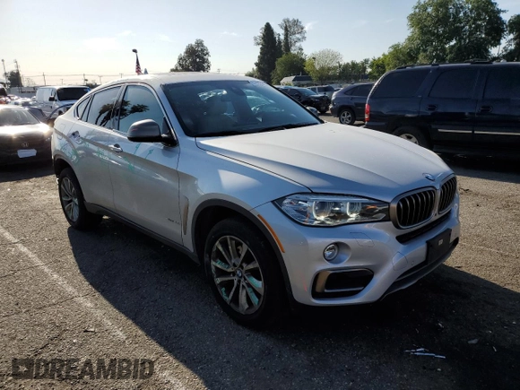 2017 BMW X6 sDrive35i z VIN 5UXKU0C38H0G68189, wystawiony jako Copart lot #52088965 z przebiegiem 71 360 mil mil oraz Szkoda całkowita • Salvage title. Historia ofert i sprzedaży dostępna na DreamBid. Obrazek 4.