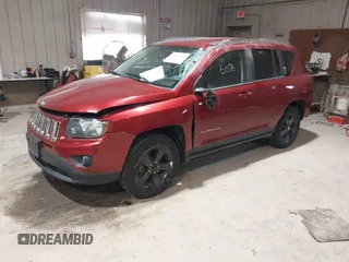 2014 Jeep Compass Sport with VIN 1C4NJDBB2ED684042, listed as a IAAI auction lot 41966076 with 136,773 mi miles. Bid and sale history available at carsss.com. Image 2.