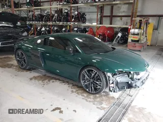 2021 Audi R8 z VIN WUAKBAFX3M7900923, wystawiony jako IAAI lot #41248773 z przebiegiem 7048 mil mil oraz . Historia ofert i sprzedaży dostępna na DreamBid. Obrazek 1.