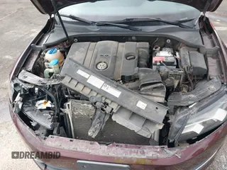 2014 Volkswagen Passat S z VIN 1VWAP7A37EC018810, wystawiony jako IAAI lot #40968457 z przebiegiem 102 606 mil mil oraz . Historia ofert i sprzedaży dostępna na DreamBid. Obrazek 10.