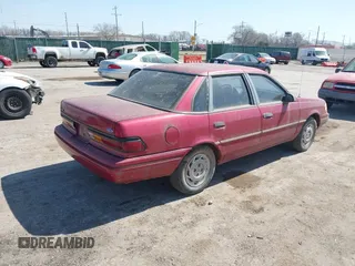 1993 Ford Tempo GL z VIN 2FAPP36X1PB133882, wystawiony jako IAAI lot #41719972 z przebiegiem 61 118 mil mil oraz . Historia ofert i sprzedaży dostępna na DreamBid. Obrazek 4.