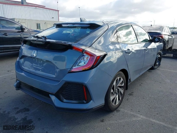 2019 Honda Civic Hatchback LX with VIN SHHFK7H30KU422168, listed as a IAAI auction lot 41742151 with 57,205 mi miles. Bid and sale history available at carsss.com. Image 4.