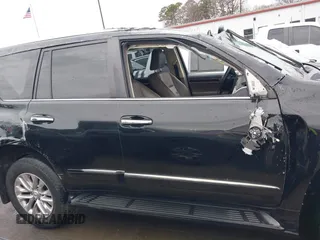 2014 Lexus GX 460 with VIN JTJBM7FX6E5073973, listed as a IAAI auction lot 41610332 with 128,870 mi miles. Bid and sale history available at carsss.com. Image 12.
