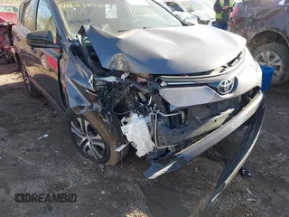 2016 Toyota RAV4 LE with VIN JTMBFREV1GJ085659, listed as a IAAI auction lot 41823575 with 141,657 mi miles. Bid and sale history available at carsss.com. Image 6.
