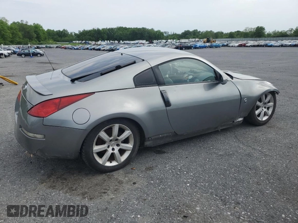 2005 Nissan 350Z Touring z VIN JN1AZ34E05M654954, wystawiony jako Copart lot #57591085 z przebiegiem Nie podano mil oraz Tytuł czysty. Historia ofert i sprzedaży dostępna na DreamBid. Obrazek 3.