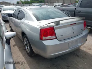 2010 Dodge Charger SXT with VIN 2B3CA3CV7AH292957, listed as a IAAI auction lot 42130665 with 253,598 mi miles and . Bid and sale history available at DreamBid. Image 3.