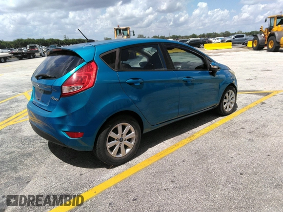 2013 Ford Fiesta SE with VIN 3FADP4EJ0DM202271, listed as a IAAI auction lot 41496985 with 174,624 mi miles. Bid and sale history available at carsss.com. Image 4.