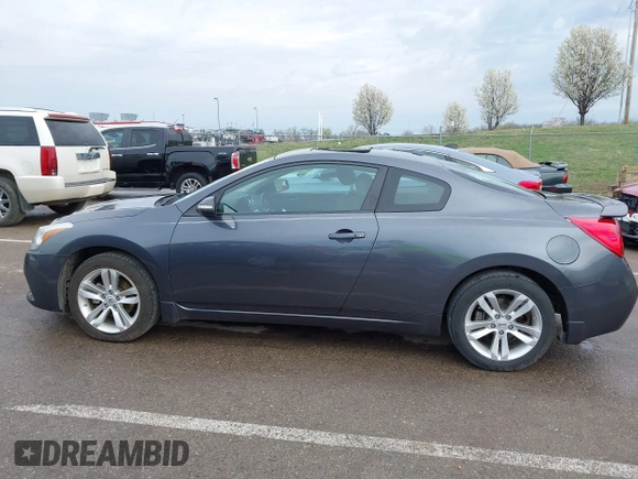 2013 Nissan Altima S with VIN 1N4AL2EP5DC217907, listed as a IAAI auction lot 41877714 with 90,409 mi miles and . Bid and sale history available at DreamBid. Image 14.
