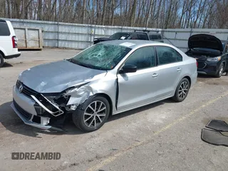 2014 Volkswagen Jetta TDI w/Premium/Nav z VIN 3VWLL7AJ3EM332617, wystawiony jako IAAI lot #42033000 z przebiegiem 186 444 mil mil oraz . Historia ofert i sprzedaży dostępna na DreamBid. Obrazek 17.