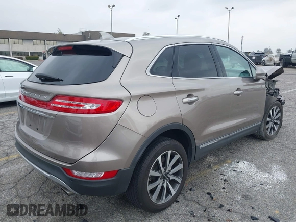 2019 Lincoln MKC Reserve with VIN 5LMCJ3C9XKUL09386, listed as a IAAI auction lot 41857681 with 66,101 mi miles and . Bid and sale history available at DreamBid. Image 4.